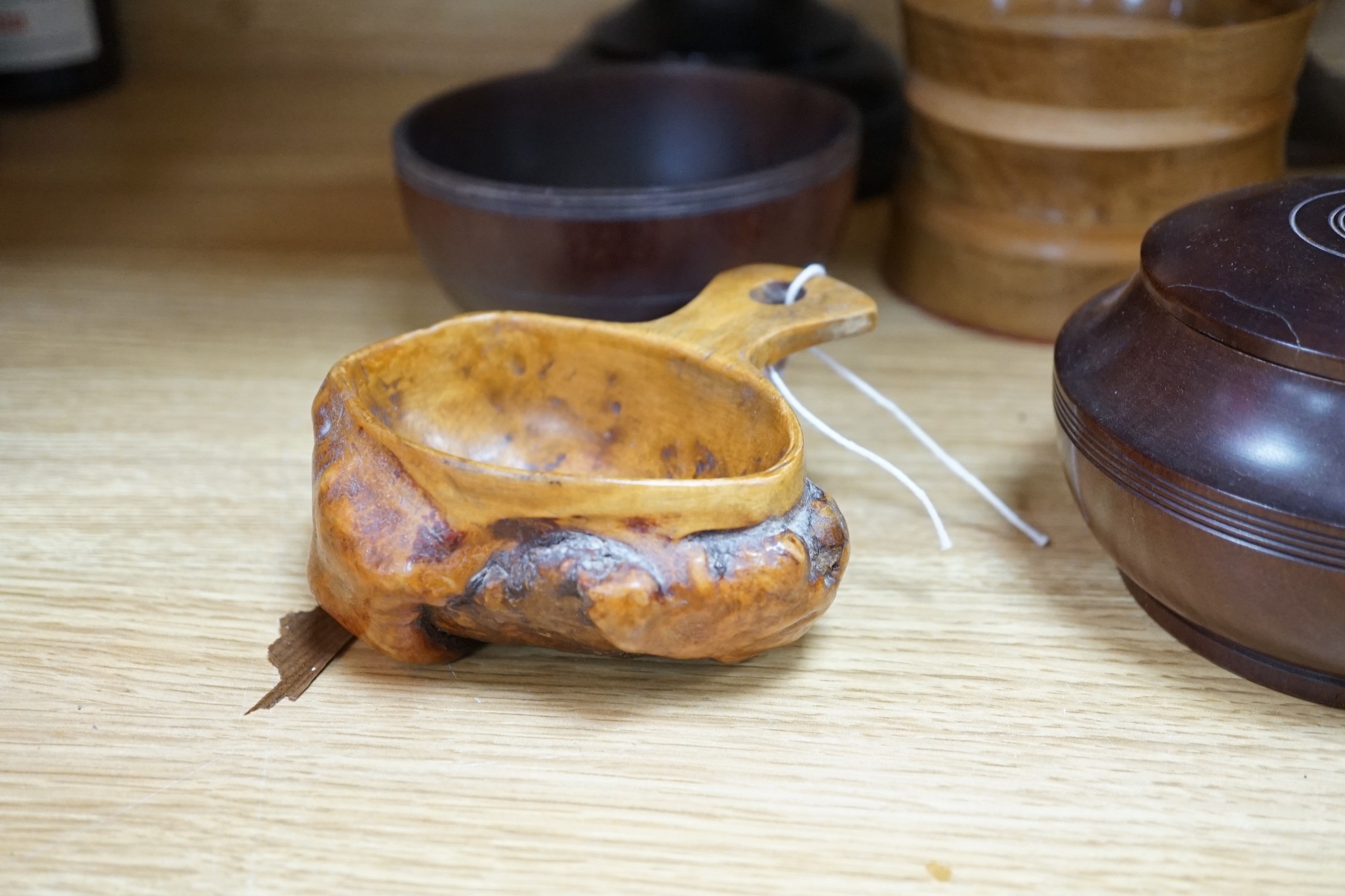 A quantity of African and other carvings including an ostrich egg
